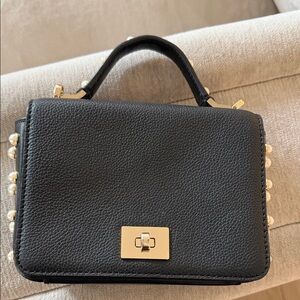 Elegant Black Handbag with Gold & Pearl Accents